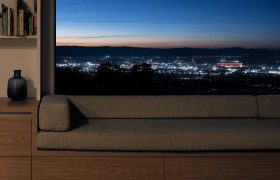 The window seat at night, with the lights of Christchurch spread out below